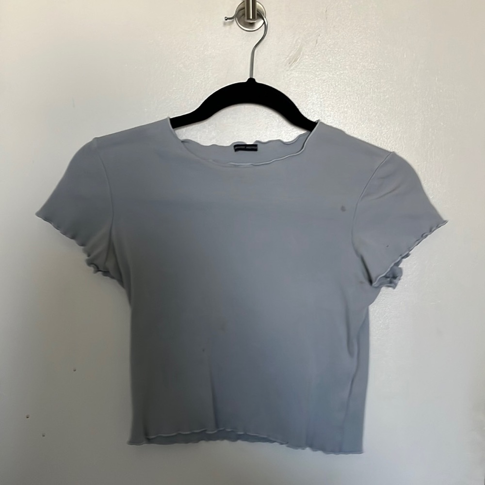 light blue ruffled top